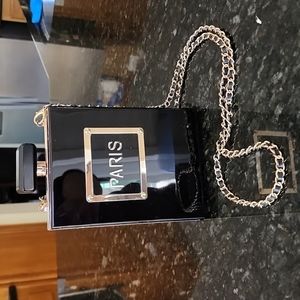Purse that looks like perfume bottle